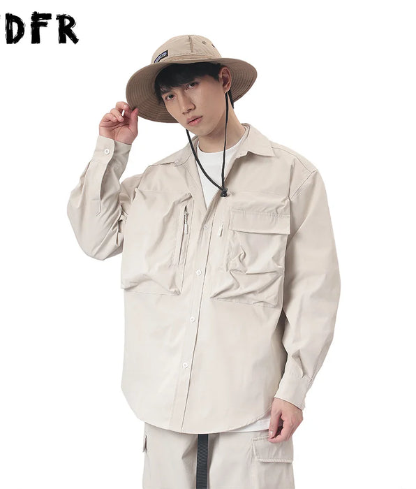 Camisas Cargo con bolsillo para hombre, camisas informales de manga larga con un solo pecho, estilo Safari, dobladillo curvo, solapa holgada, Color sólido
