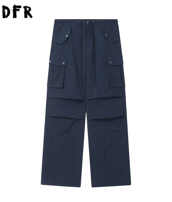 Pantalones Cargo de Color liso con bolsillo para hombre, ropa de calle con cordón, cintura elástica, holgados, rectos, pierna ancha, para correr