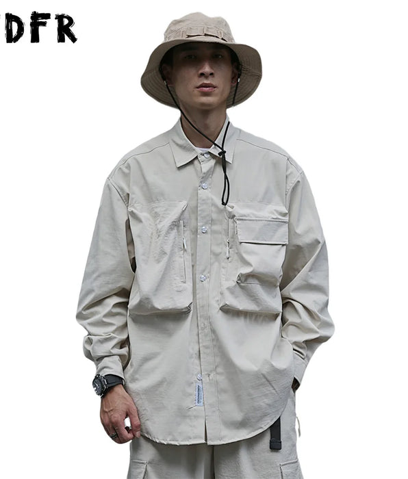Camisas Cargo con bolsillo para hombre, camisas informales de manga larga con una botonadura, estilo Safari, dobladillo curvo, solapa holgada, Color sólido, otoño