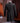 Abrigo de hombre de tweed en espiga con solapa de pico cruzada